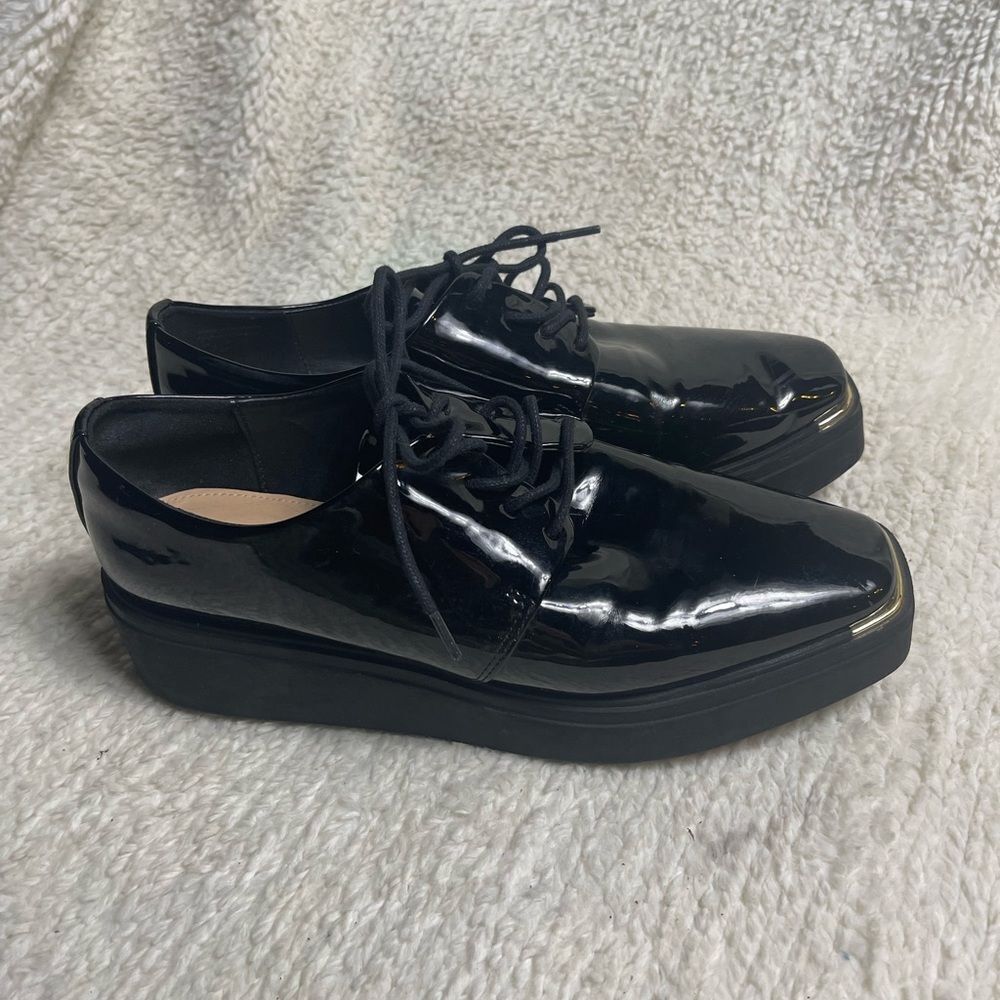 Aldo Black Patent Leather platform wedge lace up shoes SZ9 with gold accents.